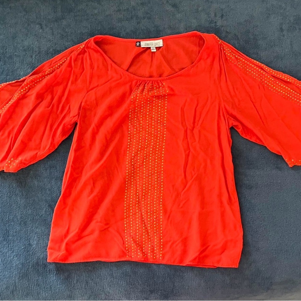 Jennifer Lopez Vibrant Red Blouse with Gold Accents